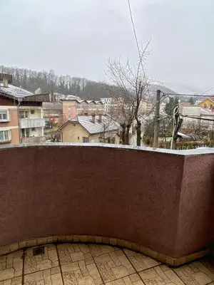 a view of a snowy city from a wall at Apartman Marko B in Vrnjačka Banja