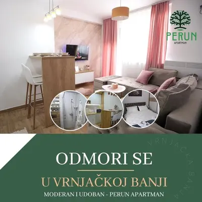 a living room with a couch and a table at PERUN in Vrnjačka Banja