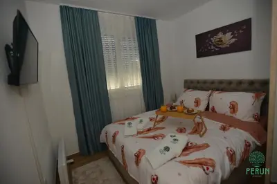 a bedroom with a bed with crabs on it at PERUN in Vrnjačka Banja