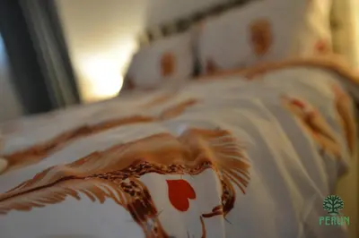 a close up of a bed with chocolate sauce at PERUN in Vrnjačka Banja