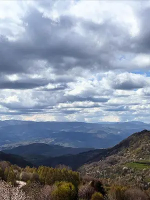 a view of a valley under a cloudy sky at Mountain Bliss Residence - Milmari Spa & Wellness in Kopaonik