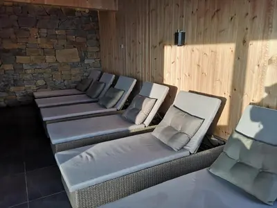 a row of empty chairs in a room at Zoned II Kopaonik - Studio Njegomir in Kopaonik