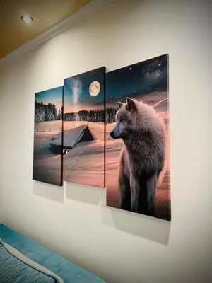 a painting of a wolf on a wall at Beli Vuk in Kopaonik
