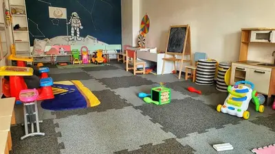 a room with a classroom with many toys in it at Apolon Spa in Vrnjačka Banja