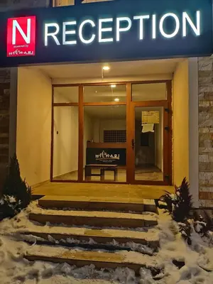 a building with a sign that reads ne reception at MILMARI Kop N10 in Kopaonik