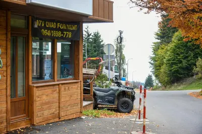 a jeep parked outside of a building at Vikendica Čeperković #3 in Kopaonik