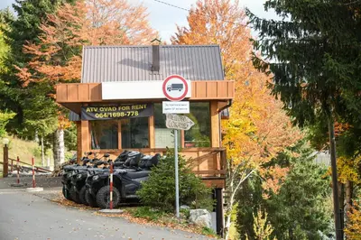 a building with a bunch of motorcycles parked in it at Vikendica Čeperković #3 in Kopaonik