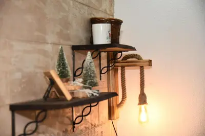 a couple of shelves on a wall with christmas decorations at Vikendica Čeperković #3 in Kopaonik