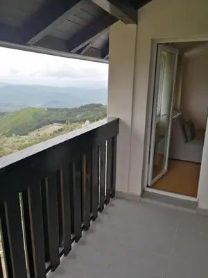a balcony with a view of the mountains at Apartman Horizont Kop in Kopaonik