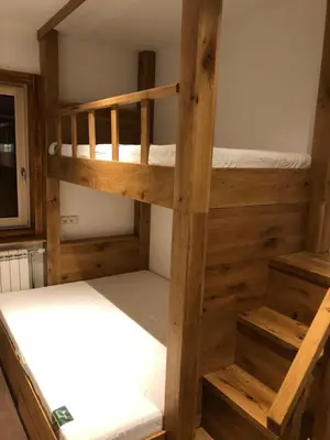 a bunk bed room with two bunk beds at Sunside Oak - 206 in Kopaonik
