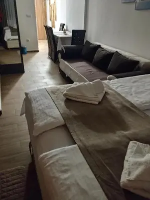 a living room with two beds and a couch at Lela Kop in Kopaonik