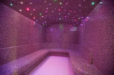 a purple room with a tub with purple lights at MK Apartments Zoned 2 Spa&Wellness in Cajetina