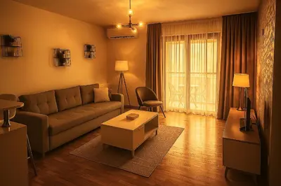 a living room with a couch and a table at Apartman Lux in Vranje