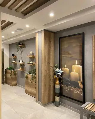 a lobby with a display case with candles in it at President Kop A 407 in Kopaonik