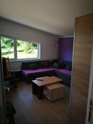 a living room with a couch and a coffee table at 