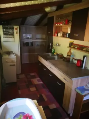 a kitchen with a sink and a counter top at 
