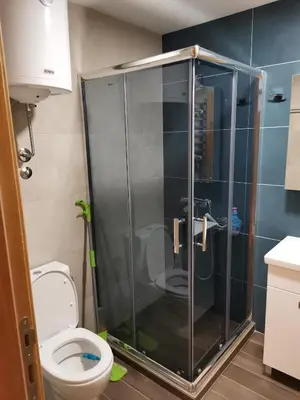 a bathroom with a shower and a toilet at JORDAN Apartment KC 9C 35 Kopaonik in Kopaonik