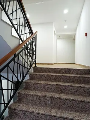 a set of stairs in a building with a white wall at President KOP A515 in Kopaonik