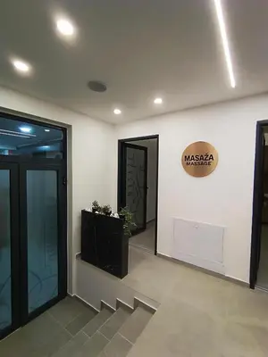 a lobby with two doors and a sign on the wall at President KOP A515 in Kopaonik