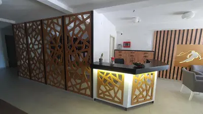 a room with a wooden partition with a counter in it at Vili.Kop studio in Kopaonik