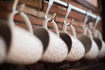 a row of polka dotted panties hanging on a brick wall at Vista Mountain House in Kopaonik