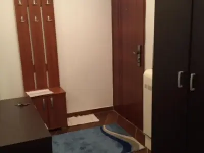 a bathroom with a toilet and a door and a floor at Studio-Apartman Dream018 in Brzeće