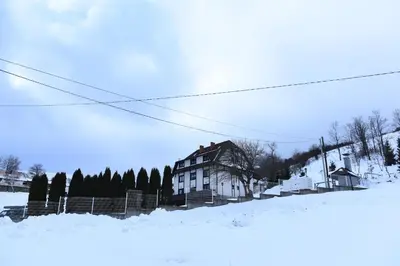a house on a hill covered in snow at Villa Mramor in Brzeće