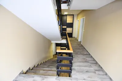 a stairwell in a building with a stair case at Villa Mramor in Brzeće