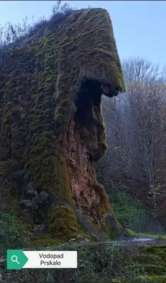 a moss covered hill with a face on it at My Place Apartmani in Krivi Vir