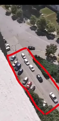 an aerial view of a parking lot with cars parked at Apartman Bonaca in Niš