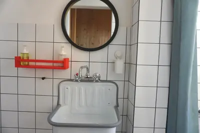 a bathroom with a sink and a mirror at Montana in Kopaonik