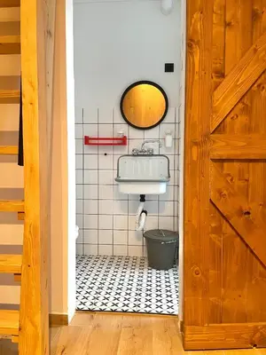 a bathroom with a sink and a toilet at Montana in Kopaonik