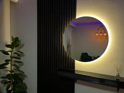 a bathroom with a mirror on a wall at STUDIO DJORDJO in Kruševac