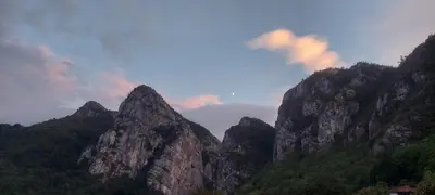 a view of a mountain range with clouds in the sky at Golemi kamik Pirot Vlasi in Pirot
