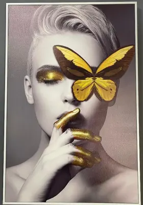 a woman with a gold butterfly on her face at STUDIO Vladana in Kruševac
