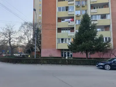 a car is parked in front of a building at City center apartment 2 in Niš
