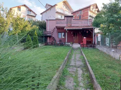 an empty yard in front of a house at Hills Apartment in Niš