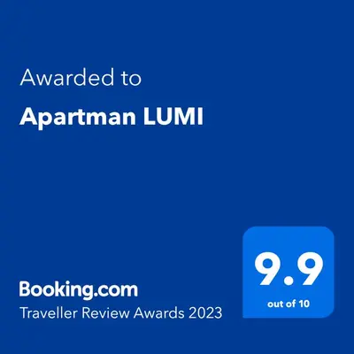 a blue screen with the text awarded to aprilrian luhm travelling review at Apartman LUMI in Vrnjačka Banja