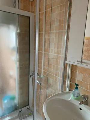 a bathroom with a sink and a shower at Aleksinac Centar in Aleksinac