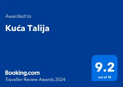 a blue screen with the text translated to kuka taliaza traveler review awards at STD Kuća Talija in Kalna