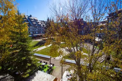 an overhead view of a park with trees and buildings at kopaonik konaci centar lux apartman in Kopaonik