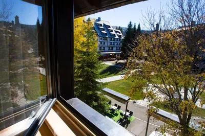 a view from a window of a building at kopaonik konaci centar lux apartman in Kopaonik