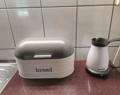 a blender on a counter with the word bread on it at Apartman kod Vrapca in Vrnjačka Banja