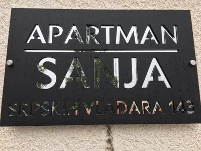 a sign for a restaurant samana sylvania at Apartman “Sanja” in Pirot