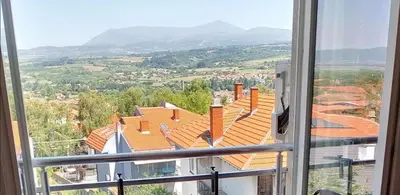 a view from a window of a building at Studio La Casa in Soko Banja