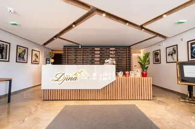 a store with a jima sign in a room at Hotel Djina - Kopaonik in Kopaonik