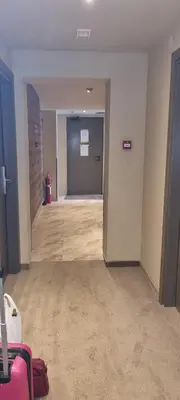 an empty room with a hallway with a door at Kraljevi Cardaci 9D 12- Sunny view in Kopaonik