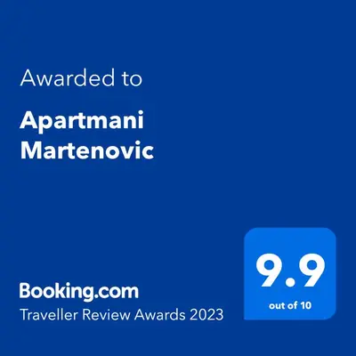 a blue phone with the text upgraded to apartment marriott marriottbuquerque at Apartmani Martenovic in Vrnjačka Banja