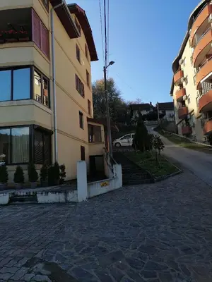 a building on the side of a street at Apartman Lala in Vrnjačka Banja