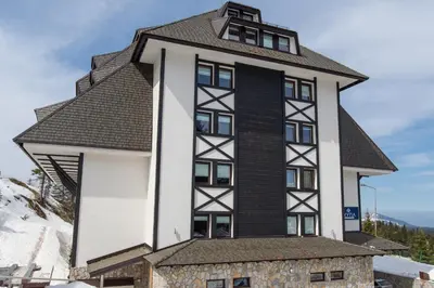 a house on top of a mountain at Five-O-Six Apartment, Župa-Kopaonik in Kopaonik